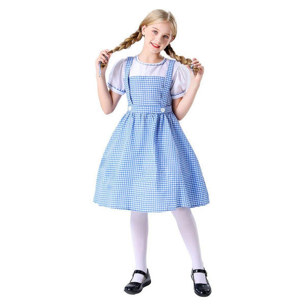 Girl styling pigtail braids in a blue gingham Dorothy costume dress