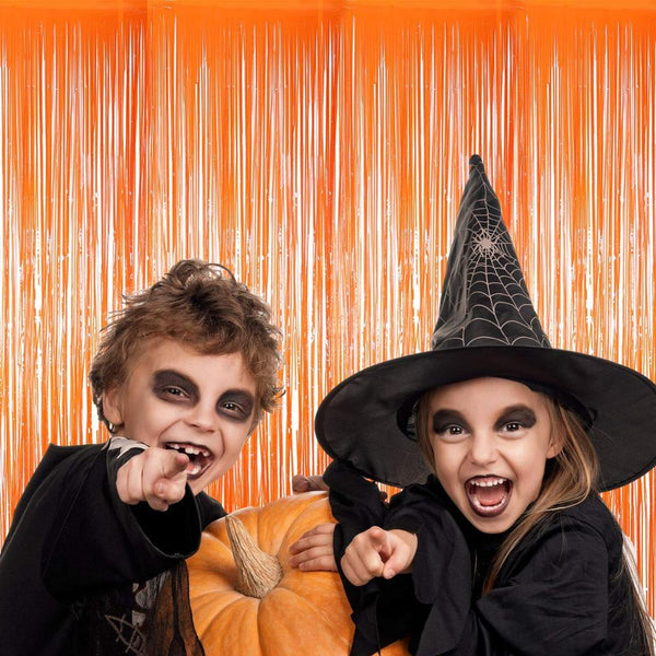 Halloween fringe curtain - foil fringe curtain used as a Halloween photo booth backdrop