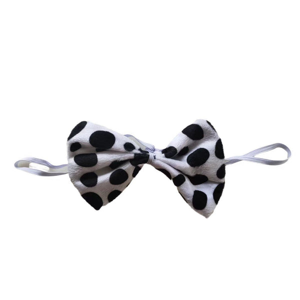 Black and white spotted Dalmatian bowtie close-up - Lets Party