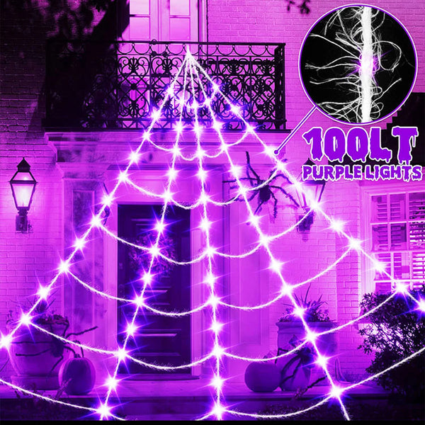 Purple Halloween spider web lights creating a spooky atmosphere