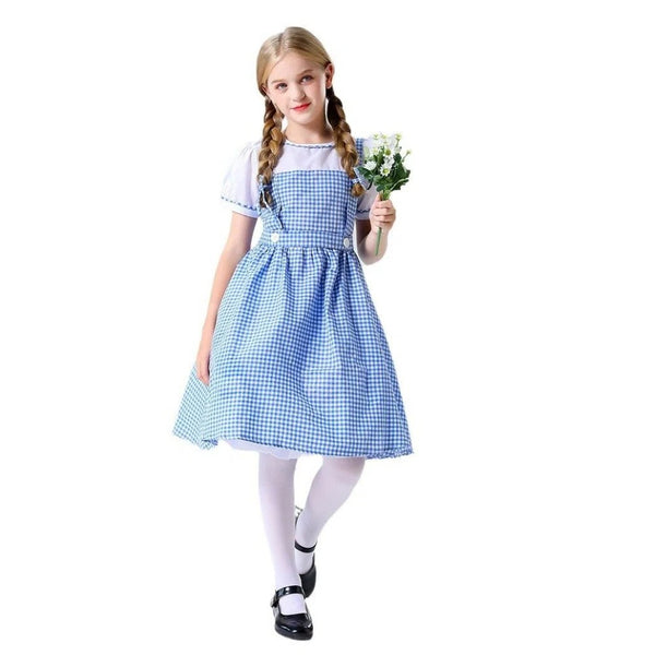 Girl in Dorothy Wizard of Oz costume holding a posy, full length