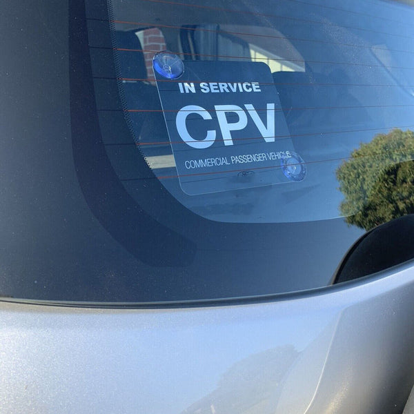 CPV sign mounted on a car windscreen using two suction cups