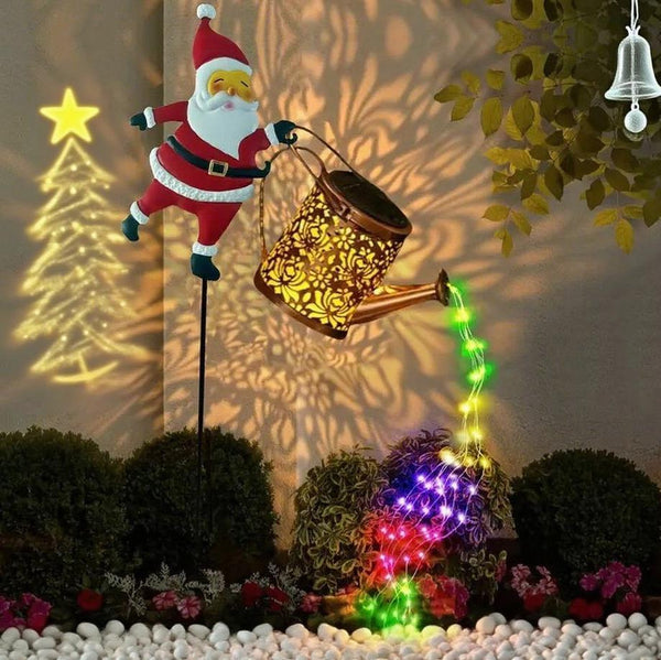 Solar Santa watering can garden light with cascading LED string lights