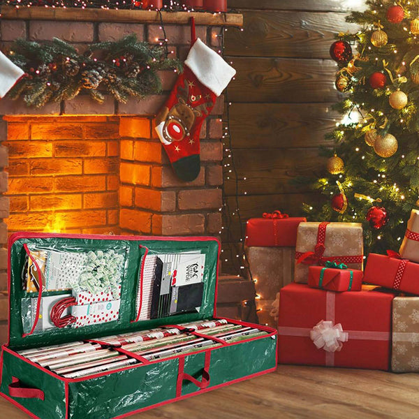 Green gift wrap organiser full of wrapping paper beside a fireplace