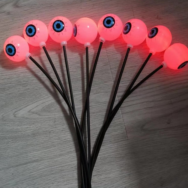 Warm white solar Halloween eyeball lights on 65cm garden stakes