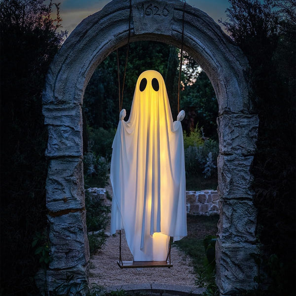 LED lights glowing through the draping fabric of a hanging ghost