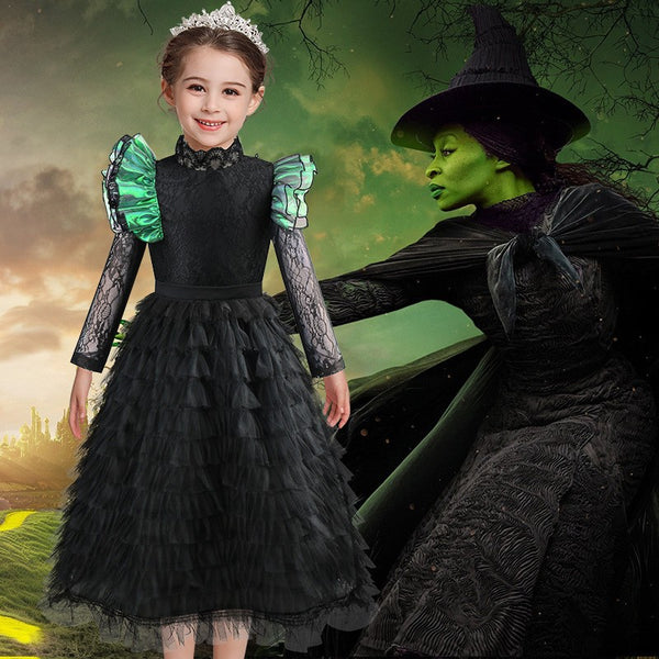 Wicked witch costume for girls - black ruffle dress with green sleeves - Lets Party
