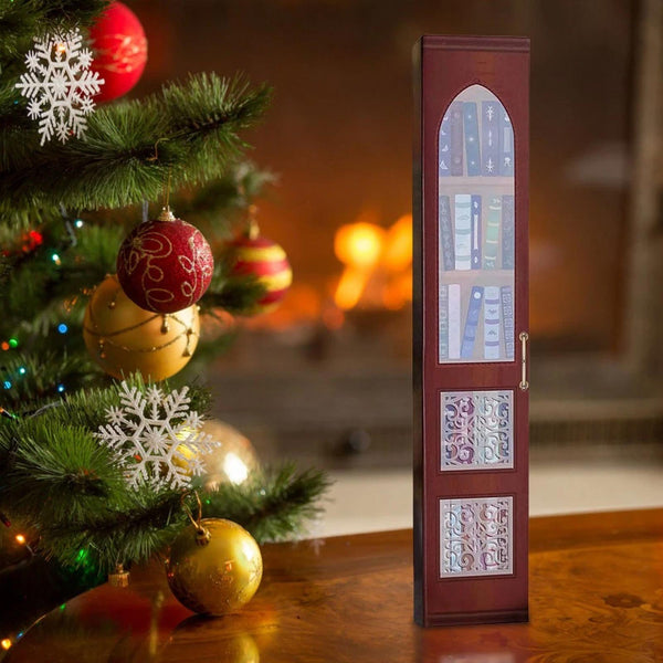 Red book advent calendar closed by a fireplace