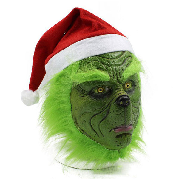 Realistic green grump latex mask worn with a Santa hat