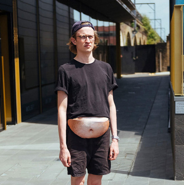 Novelty belly bag worn outdoors