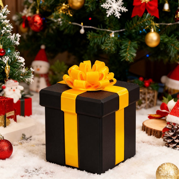 Black square annoying gift box under a Christmas tree in the snow