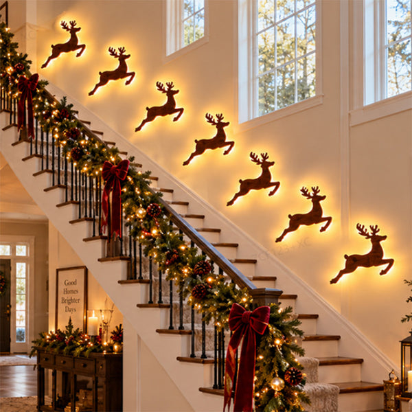 Light up reindeer wall decorations climbing a staircase - indoor Christmas lights idea