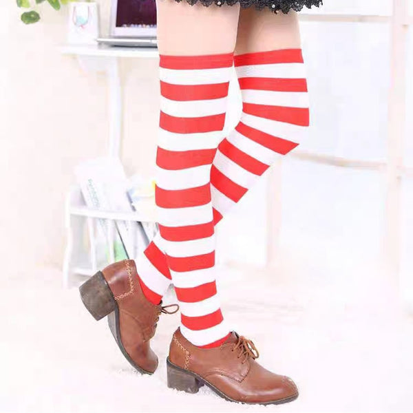 Close up of red and white striped Thing costume socks with shoes