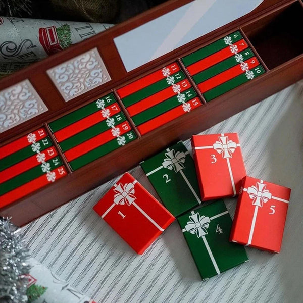 Red and green numbered mini boxes from the red advent calendar