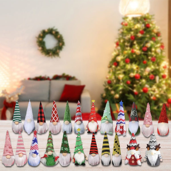 24 plush Christmas gnomes arranged on a table in front of a decorated tree