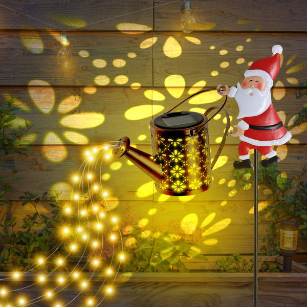 Solar panel and light sensor on the Santa watering can Christmas light