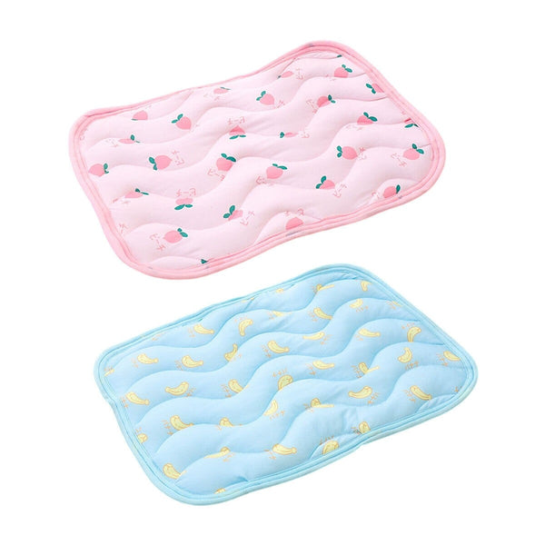Pink and blue pet cooling mats together