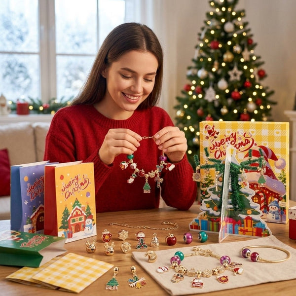 Woman making a Christmas charm bracelet at a table with the gift box and tree display
