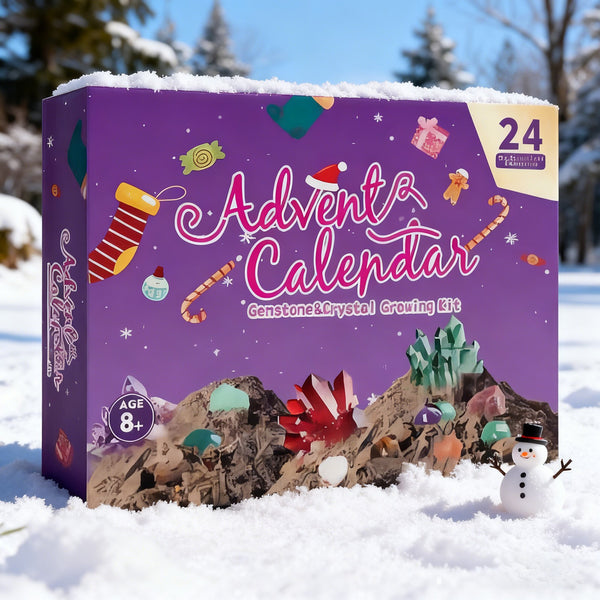 Purple crystal advent calendar box marked age 8+ on snow beside a snowman