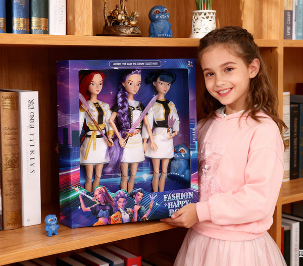 Girl with the 3-doll gift box on a bookshelf