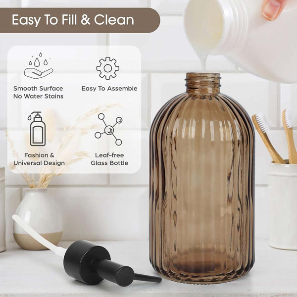 Soap dispenser bottle at a kitchen sink for dish liquid