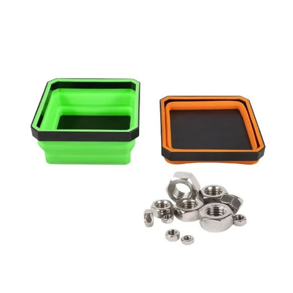 Magnetic parts tray on a workbench with hand tools