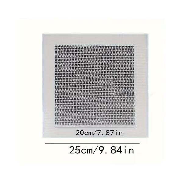 Wall repair patch kit with patches, scraper and sandpaper laid out