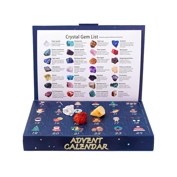 Navy advent calendar open with a crystal gem list card on the lid and stones behind numbered doors