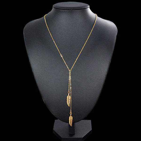 Gold chain necklace with leaf pendant, sold separately