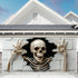 Halloween backdrop banner 180 x 400cm with a spooky print hung on a wall