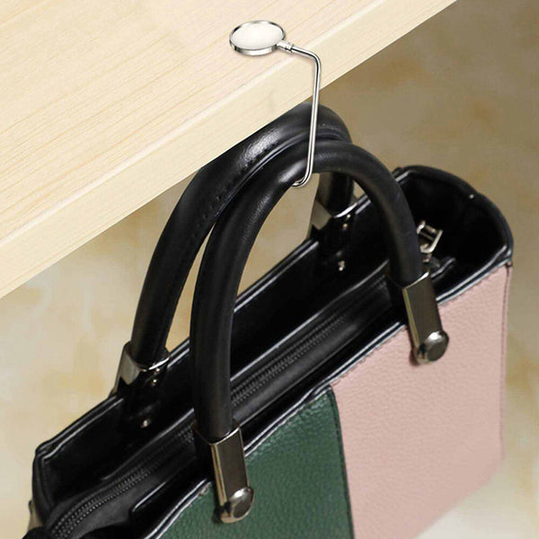 Stocking holder used as a table bag hook holding a handbag