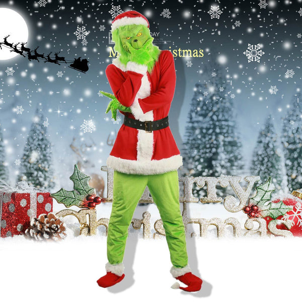 Man in the adult green Christmas costume in a snowy Christmas scene