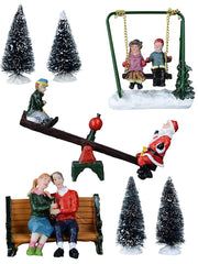 Christmas Village Figurines Set – 7 Piece Santa & Family Park Scene with Trees