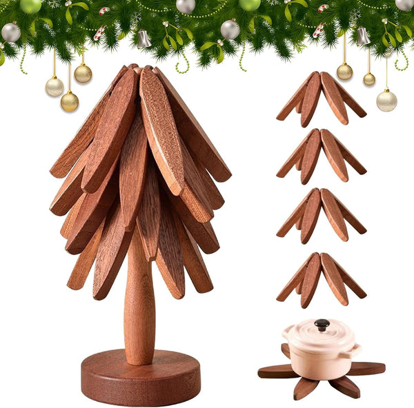 Walnut trivet tree under Christmas garland with folded trivets and a pot