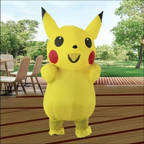 Person wearing inflatable Pikachu costume outdoors on a timber deck