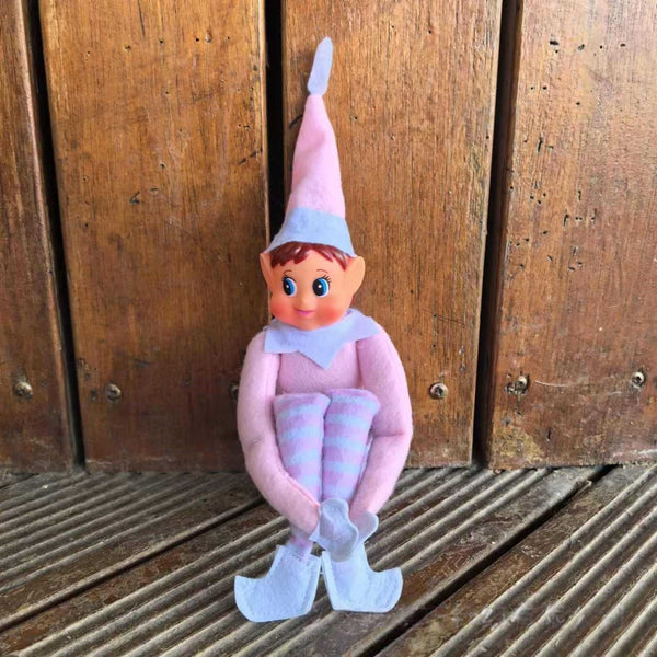 Pink girl Christmas elf doll with pastel striped legs