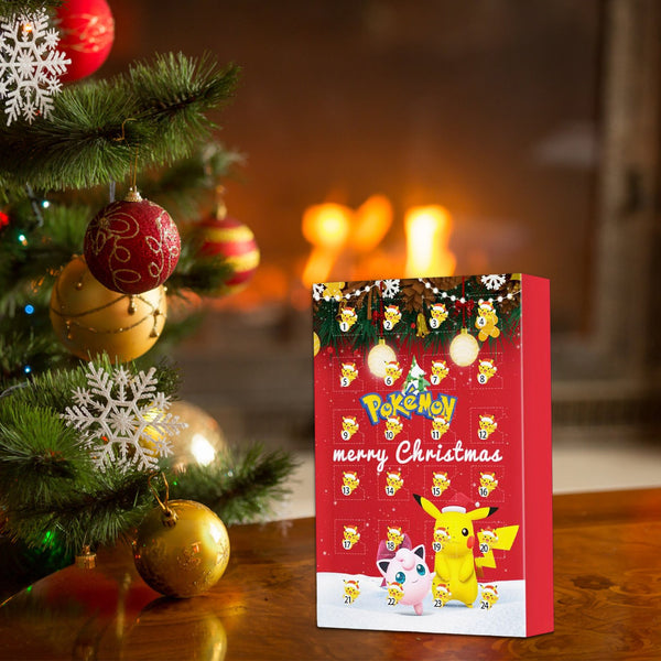 Red mini figure advent calendar box under a Christmas tree by the fireplace