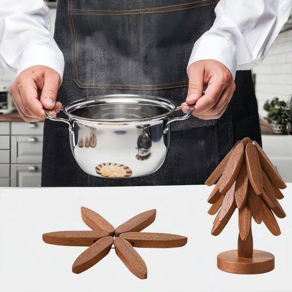 Hot saucepan placed on an opened walnut trivet