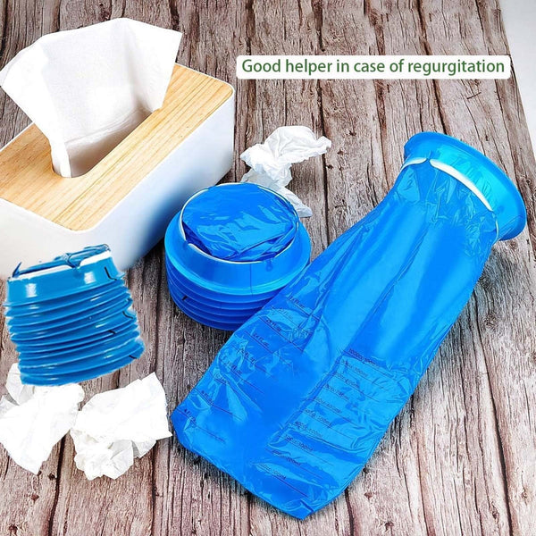 Stack of blue sick bags beside a tissue box