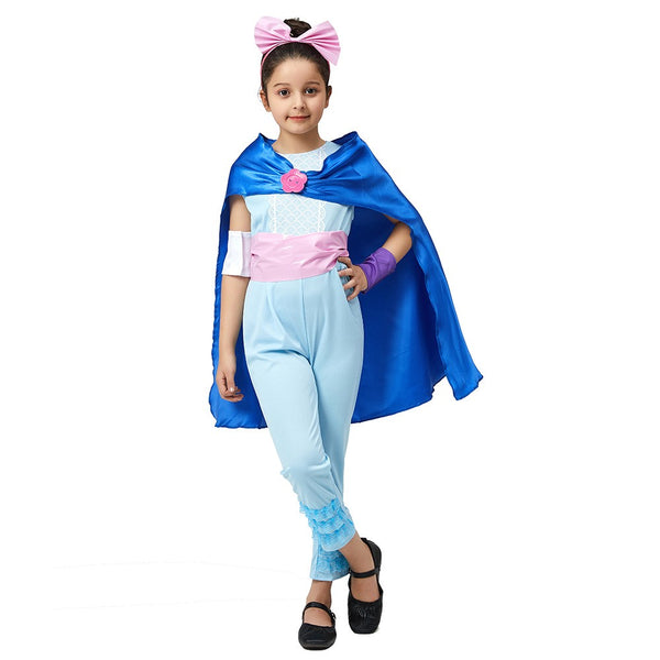 Girl walking in Bo Peep costume with navy cape and pink sash