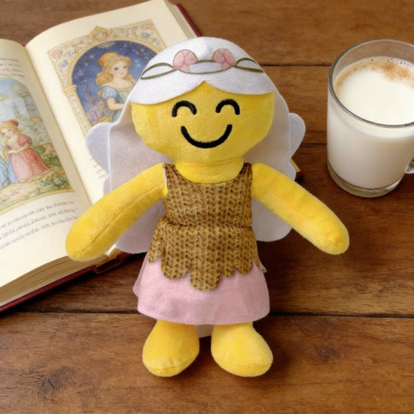 Yellow fairy plush sitting by an open storybook and a glass of milk