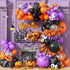 Halloween balloon garland kit in orange, purple and black with DIY spider