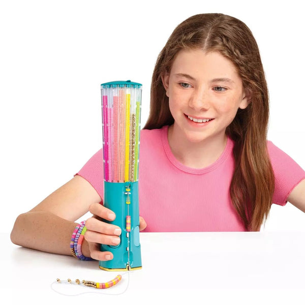 Girl using the heishi bead bracelet maker tower to thread beads