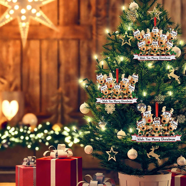 Personalised reindeer ornaments hanging on a Christmas tree
