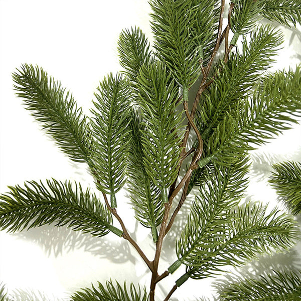 Close-up of the realistic needles on the artificial Christmas garland