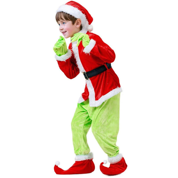 Boy in the green grump costume posing with furry green gloves