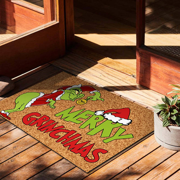 Merry Christmas grump doormat on a timber deck